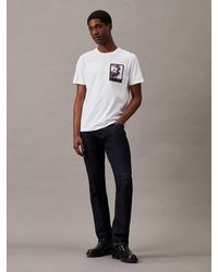 Calvin Klein - T-shirt avec imprimé graphique floral - Lyst