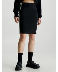 Calvin Klein - Slim Ribbed Logo Tape Skirt - Lyst