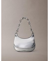 Calvin Klein - Engraved Linked Chain Metallic Shoulder Bag - Lyst