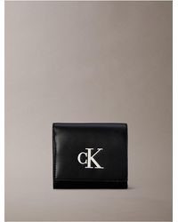 Calvin Klein - Embossed Monogram Bifold Wallet - Lyst