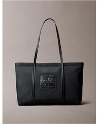 Calvin Klein - Embossed Monologo Tote Bag - Lyst