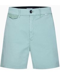 Calvin Klein Shorts chinos slim - Verde