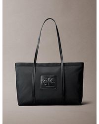 Calvin Klein - Embossed Monologo Tote Bag - Lyst