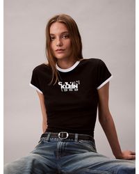 Calvin Klein - Calvin Klein 1968 Logo Graphic Baby Tee - Lyst