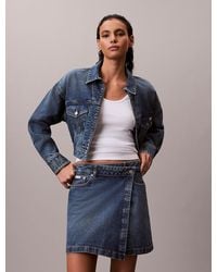 Calvin Klein - Denim Mini Wrap Skirt - Lyst
