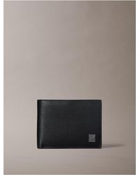 Calvin Klein - Emblem Logo Hardware Trifold Coin Wallet - Lyst