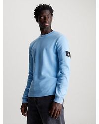 Calvin Klein - Langarmshirt BADGE WAFFLE LS TEE mit Logopatch - Lyst