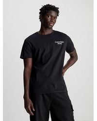 Calvin Klein - T-shirt Met Grafische Print Achter - Lyst