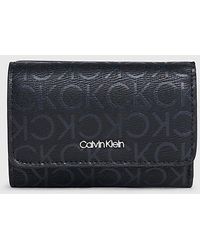Calvin Klein - Dreifach faltbares RFID-Portemonnaie mit Logo - Lyst