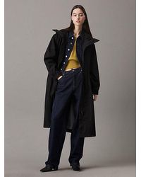 Calvin Klein - Parka técnica con capucha - Lyst