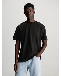 Calvin Klein - Lässiges T-Shirt mit Logo auf dem Rücken - Lyst