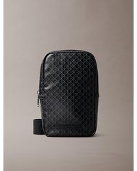 Calvin Klein - Borsa A Tracolla Quadrata Con Emblem Logo Stamoato All-Over - Lyst