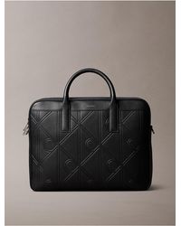 Calvin Klein - Embossed Allover Emblem Logo Commuter Bag - Lyst