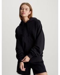 Calvin Klein - Sweat-shirt à capuche oversize avec monogramme - Lyst