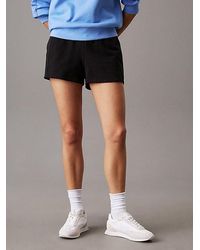 Calvin Klein - Shorts deportivos de felpa - Lyst