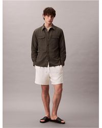 Calvin Klein - Calvin Klein Cotton Blend Boucle Pull-On Shorts - Lyst