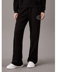 Calvin Klein - Pantalón de chándal con monograma y pierna ancha - Lyst