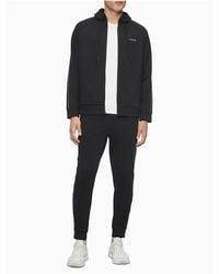 calvin klein logo tape joggers
