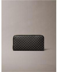 Calvin Klein - Emblem Logo Long Zip Wallet - Lyst