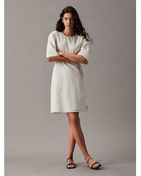Calvin Klein - Kleid mit offenem Rücken aus Seersucker aus Baumwolle - Lyst