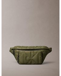 Calvin Klein - Puffer Monogram Logo Sling Bag - Lyst