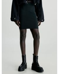 Calvin Klein - Jupe slim côtelée avec fermeture éclair dans le dos - Lyst