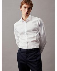 Calvin Klein - Camisa extra slim de popelín elástico - Lyst