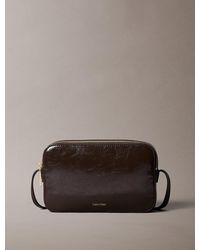Calvin Klein - Glossy Foil Logo Crossbody Camera Bag - Lyst