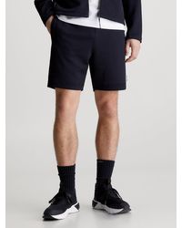 Calvin Klein - Short de sport en jacquard à ceinture double - Lyst