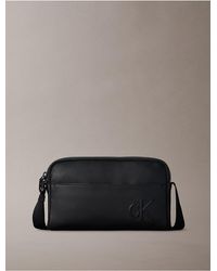 Calvin Klein - Embossed Monogram Camera Bag - Lyst