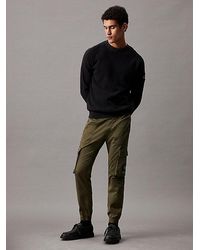 Calvin Klein - Pantalones cargo skinny lavados - Lyst