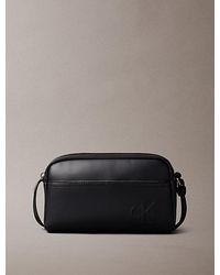 Calvin Klein - Embossed Monogram Logo Camera Bag - Lyst