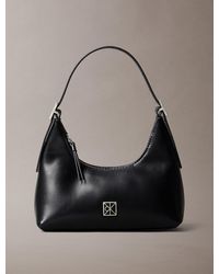Calvin Klein - Emblem Logo Leather Small Shoulder Bag - Lyst