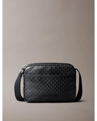 Calvin Klein - Coated Emblem Logo Crossbody Camera Bag - Lyst