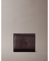 Calvin Klein - Embossed Monogram Bifold Wallet - Lyst