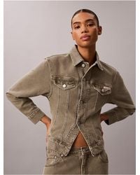 Calvin Klein - Calvin Klein Cinched Peplum Denim Jacket - Lyst