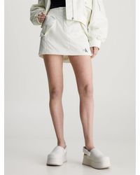 Calvin Klein - Sateen Bomber Mini Skirt - Lyst