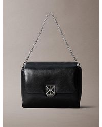 Calvin Klein - Padded Emblem Hardware Crossbody Bag - Lyst