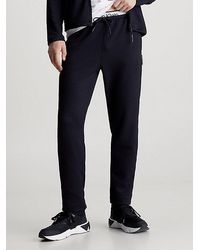 Calvin Klein - Pantalones de chándal de jacquard con cinturilla doble - Lyst