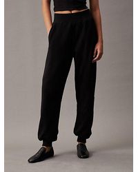 Calvin Klein - Pantalón de chándal holgado con monograma - Lyst