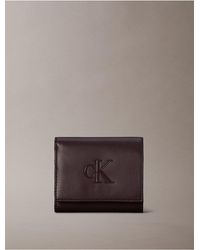 Calvin Klein - Embossed Monogram Bifold Wallet - Lyst