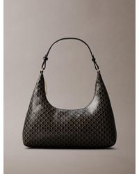 Calvin Klein - Sac Bandoulière Entièrement Imprimé De Logos Monogrammes - Lyst