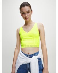 Calvin Klein Top cropped de malla con logo - Amarillo