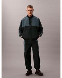 Calvin Klein - Sport Water Resistant Travel Gym Trousers - Lyst