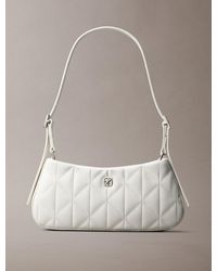 Calvin Klein - Quilted Emblem Logo Small Shoulder Bag - Lyst