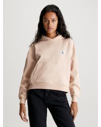 Calvin Klein - Sweat-shirt à capuche en tissu éponge de coton avec insigne - Lyst