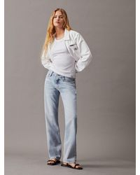 Calvin Klein - Cropped Zip Up Denim Jacket - Lyst