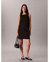Calvin Klein - Jeans All Over Logo Denim Mini Dress - Lyst