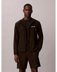 Calvin Klein - Sport Water Repellent Hooded Windbreaker - Lyst