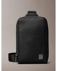 Calvin Klein - Saffiano Emblem Logo Crossbody Sling Bag - Lyst